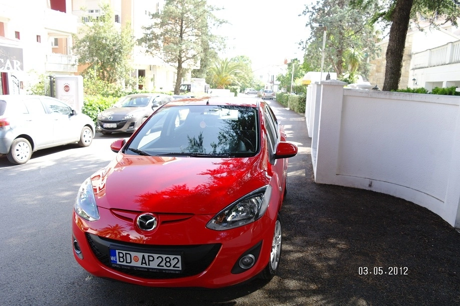 Mazda 2 2010-2015 год или аналог в Черногории